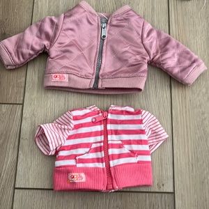 Two pink doll jackets